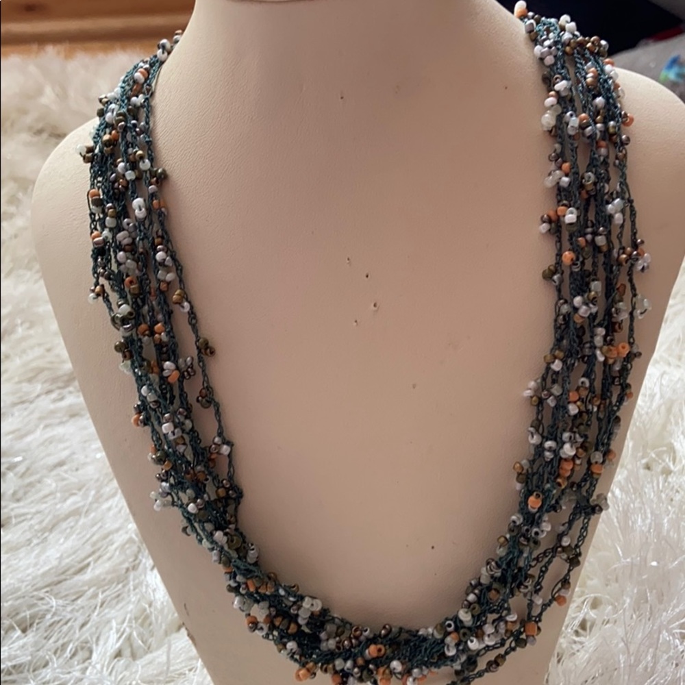 Green string necklace with matching earrings
